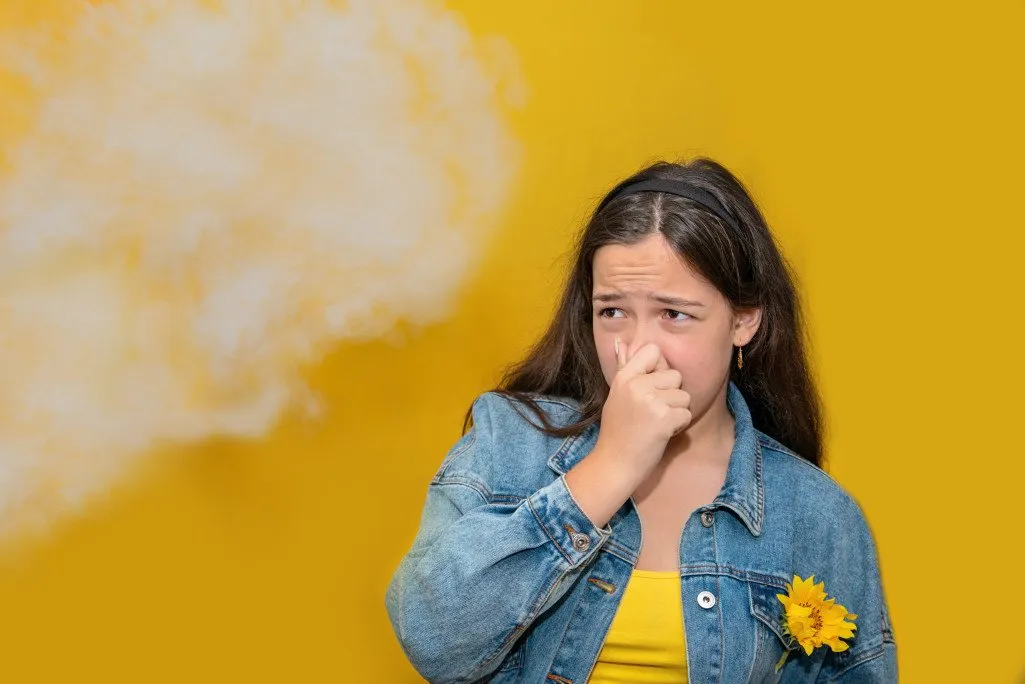 nominated passive smoking concept teen girl pinch her nose because toxic fumes from car bad smell air t20 0Xpjdo